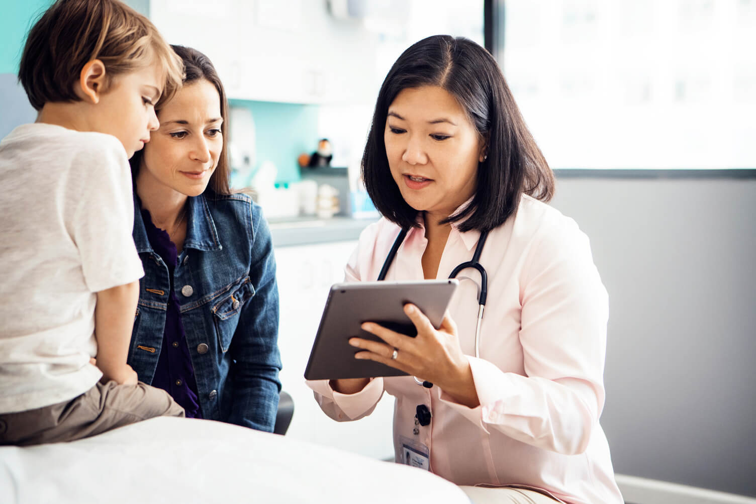 physician speaks with patient