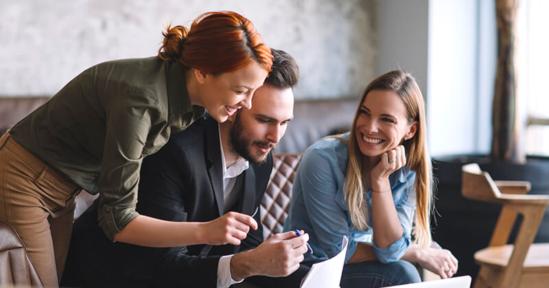 Three colleagues working together