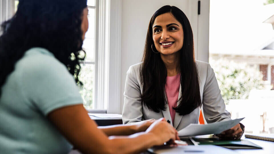 Women discussing in meeting