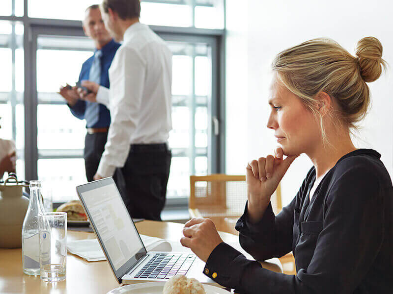 Businesswoman with laptop working