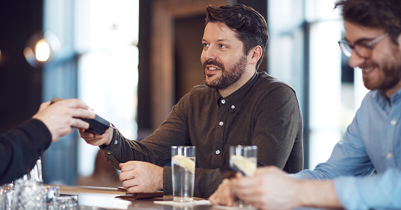 men discussing in restaurant