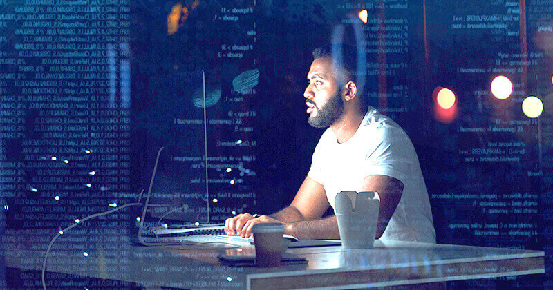 Man coding late night