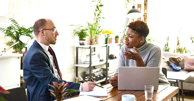 Mother discuss with financial service