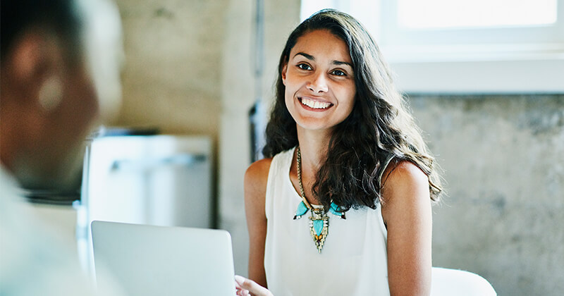 Lady in meeting smiling