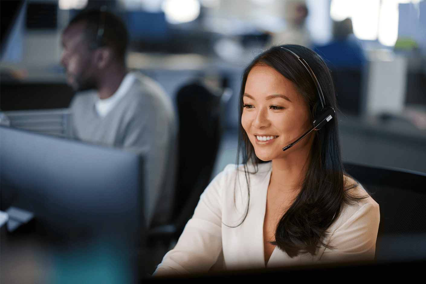 Woman smiling in call center