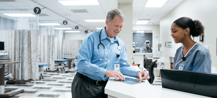 doctor at reception desk