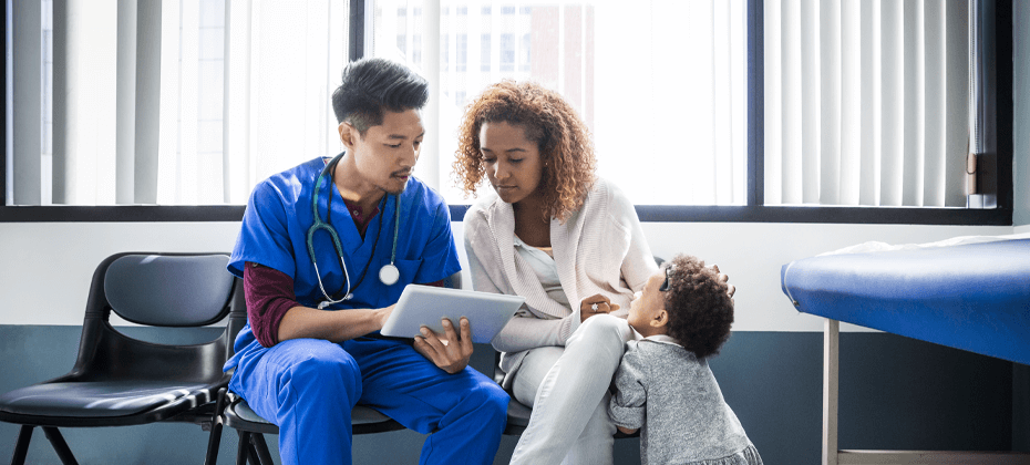 nurse and patient looking at tablet